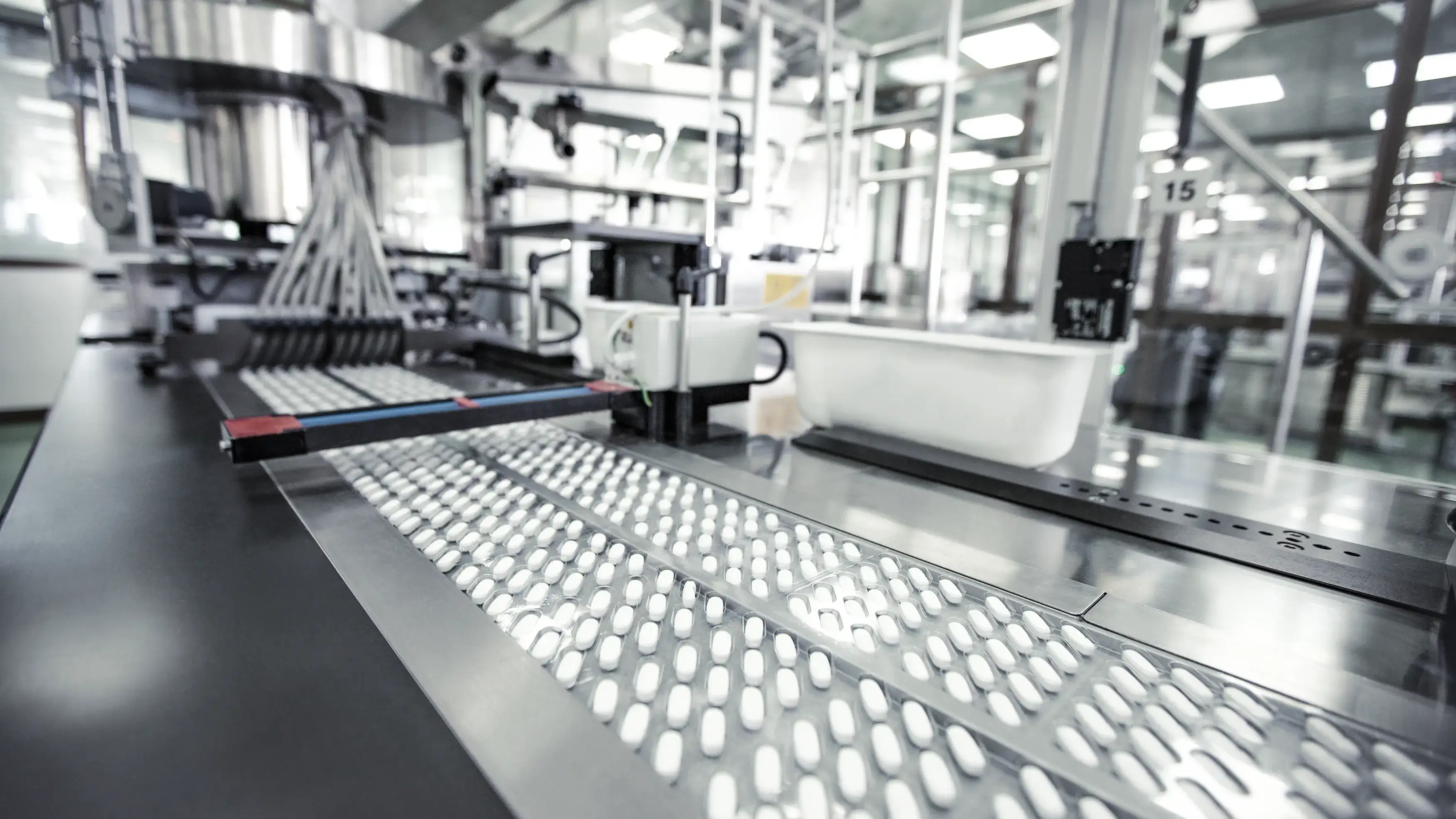 a tablet production line in a pharmaceutical production site