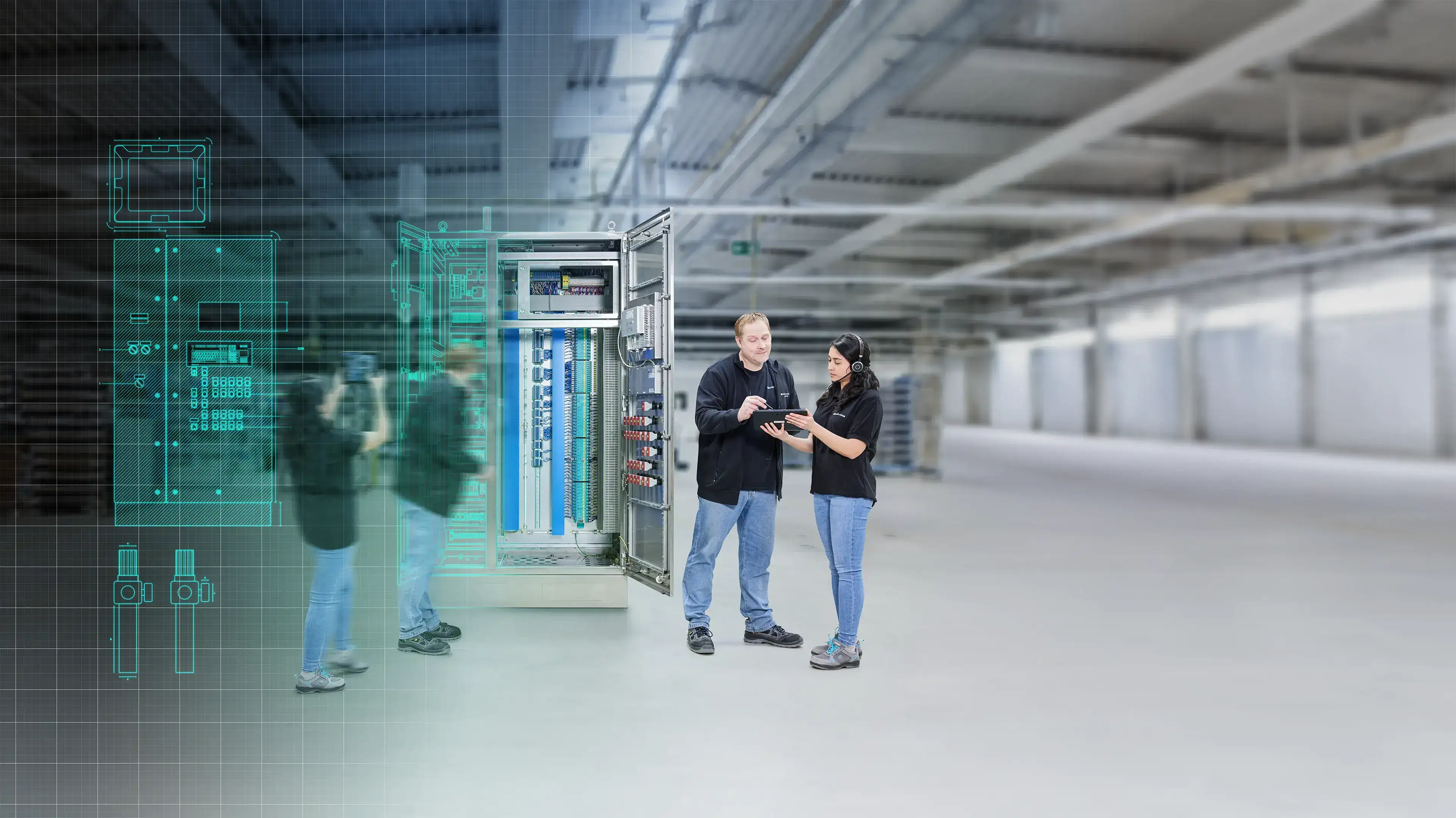 two employees in the FAT area in the Solution Engineering Center