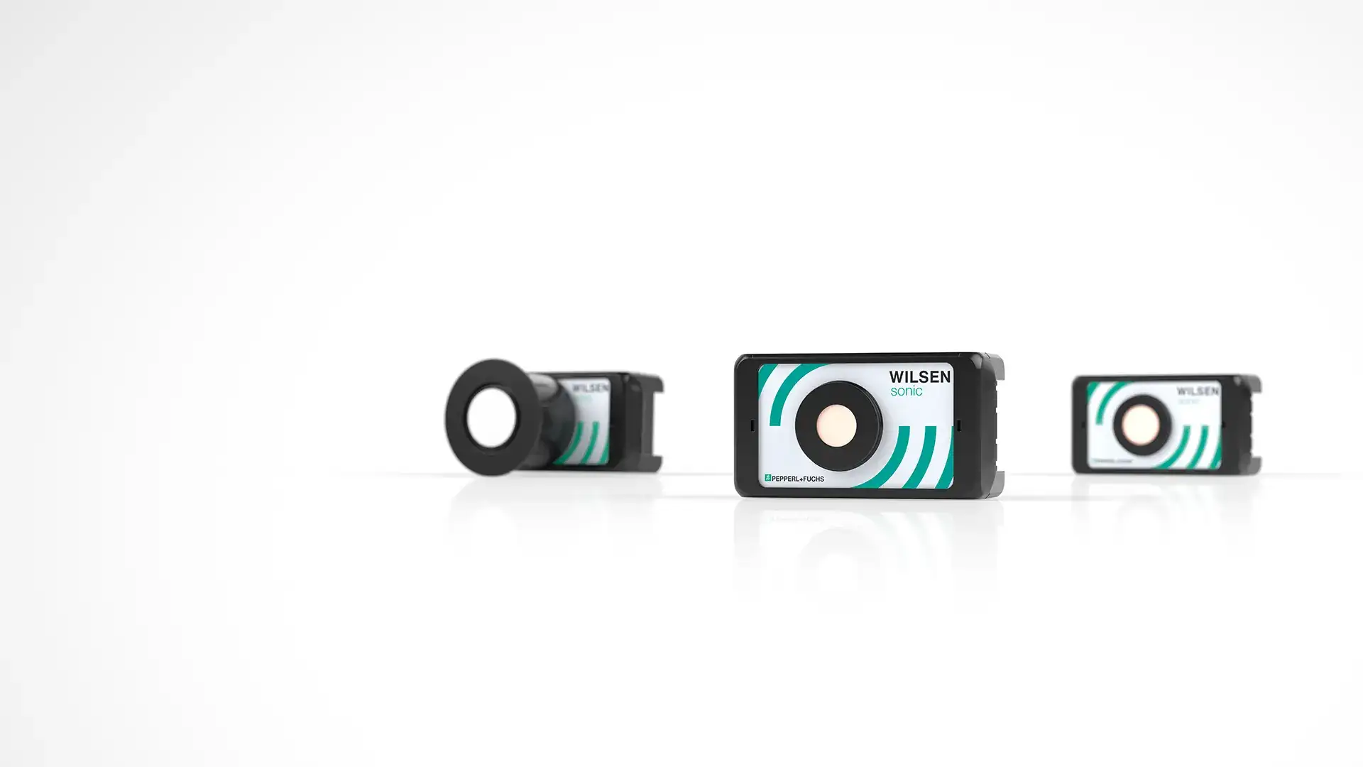 Different versions of WILSEN.sonic sensors aligned with one another