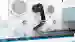 Pepperl+Fuchs ultrasonic sensors reliably measure the roll diameter in a primary packaging machine and detect web breaks in difficult transparent materials.