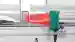 R305 retroreflective area sensor detects a polybag on conveyor belt