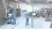 a clean room in pharma production showing operating personnel using VisuNet remote monitors from Pepperl+Fuchs a clean room in pharma production showing operating personnel using VisuNet remote monitors from Pepperl+Fuchs