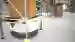An automated bot under the load carrier. The relative position of the vehicle is detected