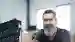 a man in a production environment with text in his face showing his thoughts