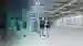 two persons talking in the FAT area of the Solution Engineering Center